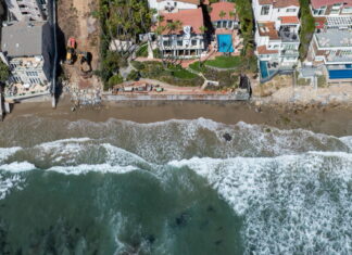 A billionaire was accused of stealing Malibu sand. Now he’s donating a new seashore to the public